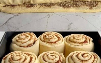 Soffici e morbidi rotoli alla cannella e noci con glassa al formaggio cremoso
